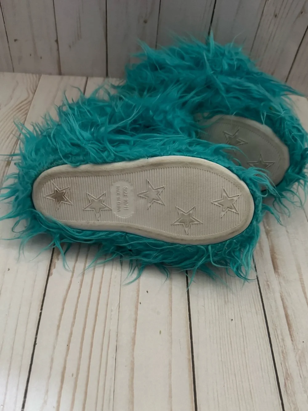 Fuzzy blue slippers